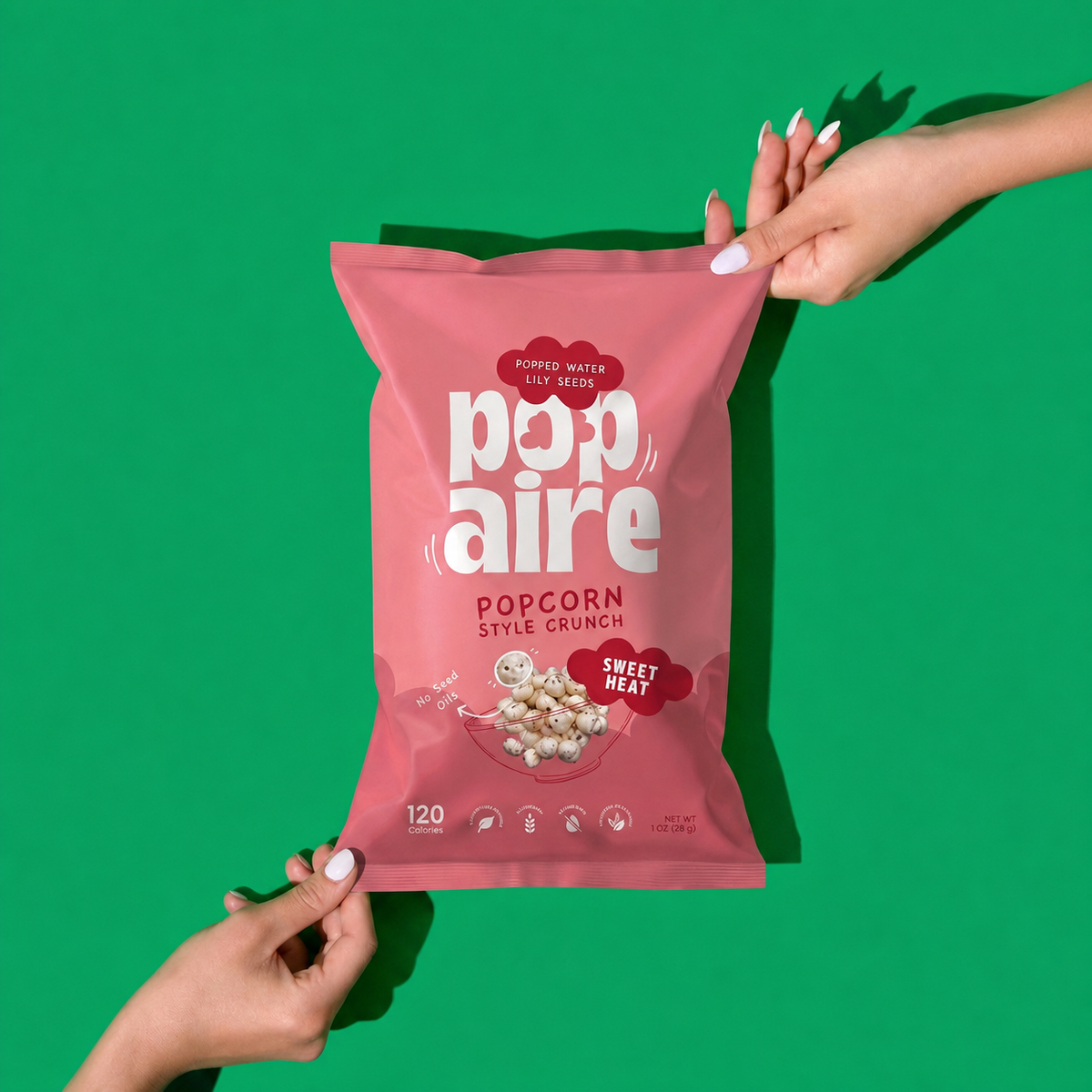 Pop Aire snack bag held against a colorful background